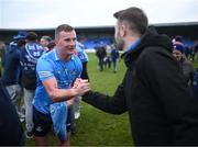 15 January 2022; Ciarán Kilkenny of Dublin with Longford manager Billy O'Loughlin following the O'Byrne Cup Group A match between Longford and Dublin at Glennon Brothers Pearse Park in Longford. Photo by Stephen McCarthy/Sportsfile