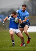 15 January 2022; Eoghán McCormack of Longford in action against Warren Egan of Dublin during the O'Byrne Cup Group A match between Longford and Dublin at Glennon Brothers Pearse Park in Longford. Photo by Stephen McCarthy/Sportsfile