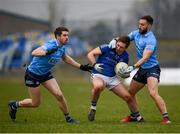 15 January 2022; Eoghán McCormack of Longford in action against Emmett Ó Conghaile, left, and Warren Egan of Dublin during the O'Byrne Cup Group A match between Longford and Dublin at Glennon Brothers Pearse Park in Longford. Photo by Stephen McCarthy/Sportsfile