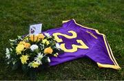 15 January 2022; A general view of the Wexford number 23 jersey, which was left vacant, and a wreath for Ashling Murphy, who was murdered in Tullamore, Offaly, earlier this week, before the O'Byrne Cup Group B match between Meath and Wexford at Ashbourne GAA Club in Ashbourne, Meath. Photo by Ben McShane/Sportsfile
