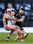 15 January 2022; Jasper Wiese of Leicester Tigers is tackled by Conor Oliver of Connacht during the Heineken Champions Cup Pool B match between Connacht and Leicester Tigers at The Sportsground in Galway. Photo by Harry Murphy/Sportsfile