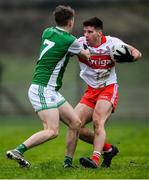 15 January 2022; Conor Doherty of Derry in action against Josh Largo Ellis of Fermanagh during the Dr McKenna Cup round 3 match between Fermanagh and Derry at Shamrock Park in Roslea, Fermanagh. Photo by Piaras Ó Mídheach/Sportsfile