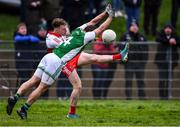 15 January 2022; Enda Downey of Derry in action against Declan McCusker of Fermanagh during the Dr McKenna Cup round 3 match between Fermanagh and Derry at Shamrock Park in Roslea, Fermanagh. Photo by Piaras Ó Mídheach/Sportsfile