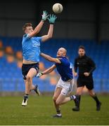 15 January 2022; Tom Lahiff of Dublin in action against Barry O'Farrell of Longford during the O'Byrne Cup Group A match between Longford and Dublin at Glennon Brothers Pearse Park in Longford. Photo by Stephen McCarthy/Sportsfile
