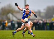 15 January 2022; Eoin Murtagh of Wicklow in action against Eoin Lowry of Laois during the O'Byrne Cup Group B match between Laois and Wicklow at Crettyard GAA Club in Laois. Photo by Daire Brennan/Sportsfile
