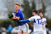 15 January 2022; Craig Maguire of Wicklow in action against Adam Campion of Laois during the O'Byrne Cup Group B match between Laois and Wicklow at Crettyard GAA Club in Laois. Photo by Daire Brennan/Sportsfile