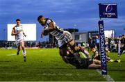 15 January 2022; Hosea Saumaki of Leicester Tigers on his way to scoring his side's fifth try despite the tackle of Matt Healy of Connacht during the Heineken Champions Cup Pool B match between Connacht and Leicester Tigers at The Sportsground in Galway. Photo by Harry Murphy/Sportsfile