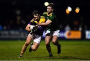 15 January 2022; Dylan Furlong of Wexford in action against Sarán Ó Fionnagáin of Meath during the O'Byrne Cup Group B match between Meath and Wexford at Ashbourne GAA Club in Ashbourne, Meath. Photo by Ben McShane/Sportsfile