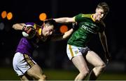 15 January 2022; Paidi Hughes of Wexford in action against Mathew Costello of Meath during the O'Byrne Cup Group B match between Meath and Wexford at Ashbourne GAA Club in Ashbourne, Meath. Photo by Ben McShane/Sportsfile