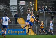 15 January 2022; Jason McCarthy of Clare and Patrick Curran of Waterford contest a high ball during the 2022 Co-op Superstores Munster Hurling Cup Semi-Final match between Clare and Waterford at Cusack Park in Ennis, Clare. Photo by Sam Barnes/Sportsfile