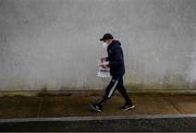16 January 2022; Laois kitman Pat Delaney carries supplies to the dressing room before the Walsh Cup Group B match between Kilkenny and Laois at John Lockes GAA Club in Callan, Kilkenny. Photo by Ray McManus/Sportsfile