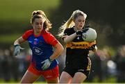 16 January 2022; Kathryn Coakley of Mourneabbey in action against Emma Duggan of St Peter's Dunboyne during the 2021 currentaccount.ie All-Ireland Ladies Senior Club Football Championship semi-final match between Mourneabbey and St Peter's Dunboyne at Clyda Rovers GAA, in Cork. Photo by Seb Daly/Sportsfile