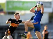16 January 2022; Denis O'Brien of St Finbarr's in action against Greg Horan of Austin Stacks during the AIB Munster GAA Football Senior Club Championship Final match between Austin Stacks and St Finbarr's at Semple Stadium in Thurles, Tipperary. Photo by Stephen McCarthy/Sportsfile