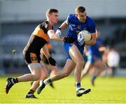 16 January 2022; Denis O'Brien of St Finbarr's in action against Greg Horan of Austin Stacks during the AIB Munster GAA Football Senior Club Championship Final match between Austin Stacks and St Finbarr's at Semple Stadium in Thurles, Tipperary. Photo by Stephen McCarthy/Sportsfile