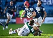 16 January 2022; Josh Van Der Flier of Leinster is tackled by Marco Tauleigne of Montpellier Hérault during the Heineken Champions Cup Pool A match between Leinster and Montpellier Hérault at RDS Arena in Dublin. Photo by David Fitzgerald/Sportsfile