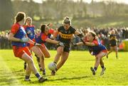 16 January 2022; Doireann O'Sullivan of Mourneabbey in action against Hannah Nolan, left, and Dee Blaney of St Peter's Dunboyne during the 2021 currentaccount.ie All-Ireland Ladies Senior Club Football Championship semi-final match between Mourneabbey and St Peter's Dunboyne at Clyda Rovers GAA, in Cork. Photo by Seb Daly/Sportsfile