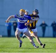 16 January 2022; Podge Delaney of Laois is tackled by Robbie Buckley of Kilkenny during the Walsh Cup Group B match between Kilkenny and Laois at John Lockes GAA Club in Callan, Kilkenny. Photo by Ray McManus/Sportsfile