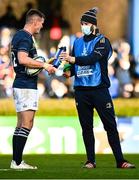 16 January 2022; Jonathan Sexton of Leinster and acting water carrier Robbie Henshaw during the Heineken Champions Cup Pool A match between Leinster and Montpellier Hérault at the RDS Arena in Dublin. Photo by Harry Murphy/Sportsfile