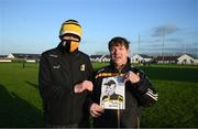 16 January 2022; Paddy Cunningham, from Callin, Co Kilkenny, presents a drawing he made to Kilkenny manager Brian Cody after the Walsh Cup Group B match between Kilkenny and Laois at John Lockes GAA Club in Callan, Kilkenny. Photo by Ray McManus/Sportsfile