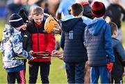 16 January 2022; Ronan Hayes of Dublin signs autographs for supporters after his side's victory in the Walsh Cup Group A match between Dublin and Galway at Parnell Park in Dublin. Photo by Piaras Ó Mídheach/Sportsfile