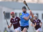 16 January 2022; Dónal Burke of Dublin scores a point as Stephen Barrett of Galway closes in during the Walsh Cup Group A match between Dublin and Galway at Parnell Park in Dublin. Photo by Piaras Ó Mídheach/Sportsfile