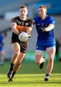 16 January 2022; Michael O'Donnell of Austin Stacks in action against Jamie Burns of St Finbarr's during the AIB Munster GAA Football Senior Club Championship Final match between Austin Stacks and St Finbarr's at Semple Stadium in Thurles, Tipperary. Photo by Stephen McCarthy/Sportsfile