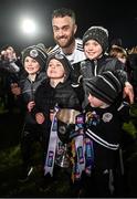 16 January 2022; Conor Laverty of Kilcoo with his children after the AIB Ulster GAA Football Club Senior Championship Final match between Derrygonnelly Harps and Kilcoo at the Athletic Grounds in Armagh. Photo by Ramsey Cardy/Sportsfile
