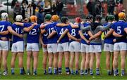 16 January 2022; Members of the Laois team observe a moments silence in memory of the late Ashling Murphy before the Walsh Cup Group B match between Kilkenny and Laois at John Lockes GAA Club in Callan, Kilkenny. Photo by Ray McManus/Sportsfile