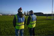 16 January 2022; Stewards from the host club watch the Walsh Cup Group B match between Kilkenny and Laois at John Lockes GAA Club in Callan, Kilkenny. Photo by Ray McManus/Sportsfile