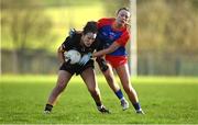 16 January 2022; Roisin O'Sullivan of Mourneabbey in action against Saoirse Quinn of St Peter's Dunboyne during the 2021 currentaccount.ie All-Ireland Ladies Senior Club Football Championship semi-final match between Mourneabbey and St Peter's Dunboyne at Clyda Rovers GAA, in Cork. Photo by Seb Daly/Sportsfile