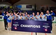 18 January 2022; Colaiste Ailigh players and coaches celebrate with the cup after the Pinergy Basketball Ireland U19 B Girls Schools Cup Final match between Pipers Colaiste Ailigh, Letterkenny, Donegal, and Laurel Hill SS, Cahir, Limerick, at the National Basketball Arena in Dublin. Photo by Ben McShane/Sportsfile