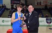 18 January 2022; Basketball Ireland President PJ Reidy, right, presents cup to Colaiste na hInse captain Conor Phelan after the Pinergy Basketball Ireland U16 C Boys Schools Cup Final match between Colaiste na hInse, Bettystown, Meath, and Cistercian College, Roscrea, Tipperary, at the National Basketball Arena in Dublin. Photo by Ben McShane/Sportsfile