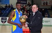 18 January 2022; Basketball Ireland President PJ Reidy, right, presents the MVP to Ebenezer Ehige of Colaiste na hInse after the Pinergy Basketball Ireland U16 C Boys Schools Cup Final match between Colaiste na hInse, Bettystown, Meath, and Cistercian College, Roscrea, Tipperary, at the National Basketball Arena in Dublin. Photo by Ben McShane/Sportsfile