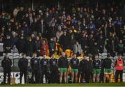 18 January 2022; Michael Murphy of Donegal, centre, and fellow substitutes stand for Amhrán na bhFiann before the Dr McKenna Cup Semi-Final match between Donegal and Derry at Páirc MacCumhaill in Ballybofey, Donegal. Photo by David Fitzgerald/Sportsfile