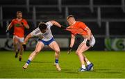 18 January 2022; Killian Lavelle of Monaghan in action against Ross McQuillan of Armagh during the Dr McKenna Cup Semi-Final match between Armagh and Monaghan at the Athletic Grounds in Armagh. Photo by Philip Fitzpatrick/Sportsfile Photo by Philip Fitzpatrick/Sportsfile