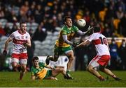 18 January 2022; Paul Brennan of Donegal in action against Benny Herron of Derry during the Dr McKenna Cup Semi-Final match between Donegal and Derry at Páirc MacCumhaill in Ballybofey, Donegal. Photo by David Fitzgerald/Sportsfile