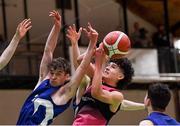19 January 2022; Patryk Rejkowicz of St Munchin's College in action against Hugo Kelly of Blackrock College, left, during the Pinergy Basketball Ireland U19 B Boys Schools Cup Final match between Blackrock College, Dublin, and St Munchin’s College, Limerick, at the National Basketball Arena in Dublin. Photo by Piaras Ó Mídheach/Sportsfile