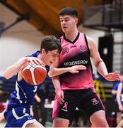 19 January 2022; Maitiú Heckmann of Blackrock College in action against Reece Barry of St Munchin's College during the Pinergy Basketball Ireland U19 B Boys Schools Cup Final match between Blackrock College, Dublin, and St Munchin’s College, Limerick, at the National Basketball Arena in Dublin. Photo by Piaras Ó Mídheach/Sportsfile