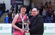 19 January 2022; Basketball Ireland president PJ Reidy presents the cup to St Munchin's College captain Reece Barry after the Pinergy Basketball Ireland U19 B Boys Schools Cup Final match between Blackrock College, Dublin, and St Munchin’s College, Limerick, at the National Basketball Arena in Dublin. Photo by Piaras Ó Mídheach/Sportsfile