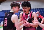 19 January 2022; St Munchin's players Patryk Rejkowicz, right, and Liam Price celebrate after their side's victory in the Pinergy Basketball Ireland U19 B Boys Schools Cup Final match between Blackrock College, Dublin, and St Munchin’s College, Limerick, at the National Basketball Arena in Dublin. Photo by Piaras Ó Mídheach/Sportsfile