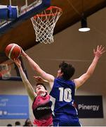 19 January 2022; Liam Price of St Munchin's College in action against Eric Brandt of Blackrock College during the Pinergy Basketball Ireland U19 B Boys Schools Cup Final match between Blackrock College, Dublin, and St Munchin’s College, Limerick, at the National Basketball Arena in Dublin. Photo by Piaras Ó Mídheach/Sportsfile