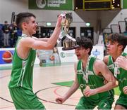 19 January 2022; St Malachy’s College captain Luke Donnelly lifts the cup as he celebrates with his teammates after their side's victory in the Pinergy Basketball Ireland U19 A Boys Schools Cup Final match between St Malachy’s College, Belfast, and Mercy Mounthawk, Tralee, Kerry, at the National Basketball Arena in Dublin. Photo by Piaras Ó Mídheach/Sportsfile