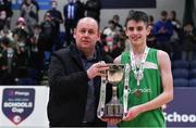 19 January 2022; Basketball Ireland president PJ Reidy presents the cup to St Malachy’s College captain Luke Donnelly after the Pinergy Basketball Ireland U19 A Boys Schools Cup Final match between St Malachy’s College, Belfast, and Mercy Mounthawk, Tralee, Kerry, at the National Basketball Arena in Dublin. Photo by Piaras Ó Mídheach/Sportsfile
