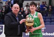 19 January 2022; Basketball Ireland president PJ Reidy presents the MVP award to Ryan Calo after the Pinergy Basketball Ireland U19 A Boys Schools Cup Final match between St Malachy’s College, Belfast, and Mercy Mounthawk, Tralee, Kerry, at the National Basketball Arena in Dublin. Photo by Piaras Ó Mídheach/Sportsfile