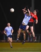 19 January 2022; Michael O'Gara of UCC in action against Daragh Ryan of UCD during the Electric Ireland Higher Education GAA Sigerson Cup Round 2 match between University College Dublin and University College Cork at UCD Billings Park in Dublin. Photo by Stephen McCarthy/Sportsfile