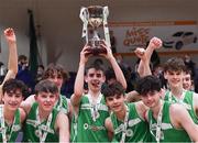 19 January 2022; St Malachy’s College captain Luke Donnelly lifts the cup as he celebrates with teammates after their side's victory in the Pinergy Basketball Ireland U19 A Boys Schools Cup Final match between St Malachy’s College, Belfast, and Mercy Mounthawk, Tralee, Kerry, at the National Basketball Arena in Dublin. Photo by Piaras Ó Mídheach/Sportsfile