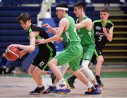19 January 2022; Evan Boyle of Mercy Mounthalk in action against Michael Donnelly and Luke Donnelly, 5, of St Malachy's College during the Pinergy Basketball Ireland U19 A Boys Schools Cup Final match between St Malachy’s College, Belfast, and Mercy Mounthawk, Tralee, Kerry, at the National Basketball Arena in Dublin. Photo by Piaras Ó Mídheach/Sportsfile