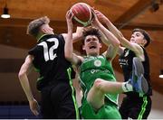 19 January 2022; Jake McCotter of St Malachy's College is tackled by Roan Grattan, left, and Evan Boyle of Mercy Mounthawk during the Pinergy Basketball Ireland U19 A Boys Schools Cup Final match between St Malachy’s College, Belfast, and Mercy Mounthawk, Tralee, Kerry, at the National Basketball Arena in Dublin. Photo by Piaras Ó Mídheach/Sportsfile