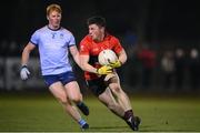 19 January 2022; Mark Cronin of UCC and Ryan O'Toole of UCD during the Electric Ireland Higher Education GAA Sigerson Cup Round 2 match between University College Dublin and University College Cork at UCD Billings Park in Dublin. Photo by Stephen McCarthy/Sportsfile