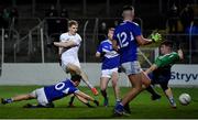 19 January 2022; Daniel Flynn of Kildare has his shot on goal blocked by Brian Byrne of Laois, left, during the O'Byrne Cup Semi-Final match between Laois and Kildare at Netwatch Cullen Park in Carlow. Photo by Seb Daly/Sportsfile